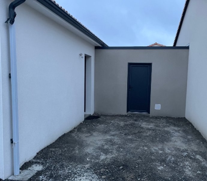 Annexe en béton enduit Toit Terrasse